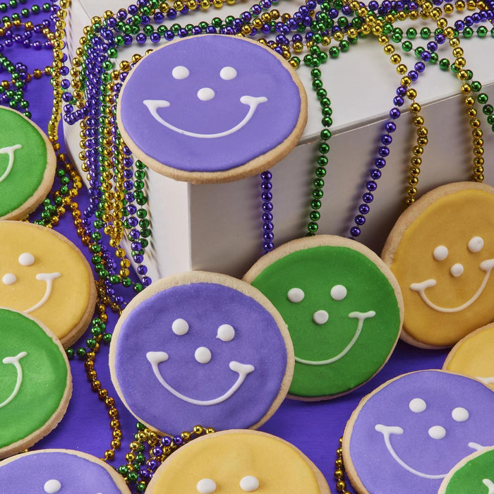 Mardi Gras treats - festive purple green and gold smiley cookies paired with mardi gras beads in a gift box