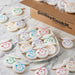 Bulk Pack Graduation Smiley Cookies - Colorful Face, White Base, Smiley Cookie