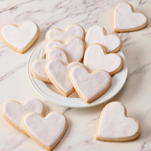 Heart Shaped White Iced Cookies  - SmileyCookie.com individually wrapped, nut - free, and kosher cookies delivered to you!