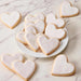 Heart Shaped White Iced Cookies  - SmileyCookie.com individually wrapped, nut - free, and kosher cookies delivered to you!